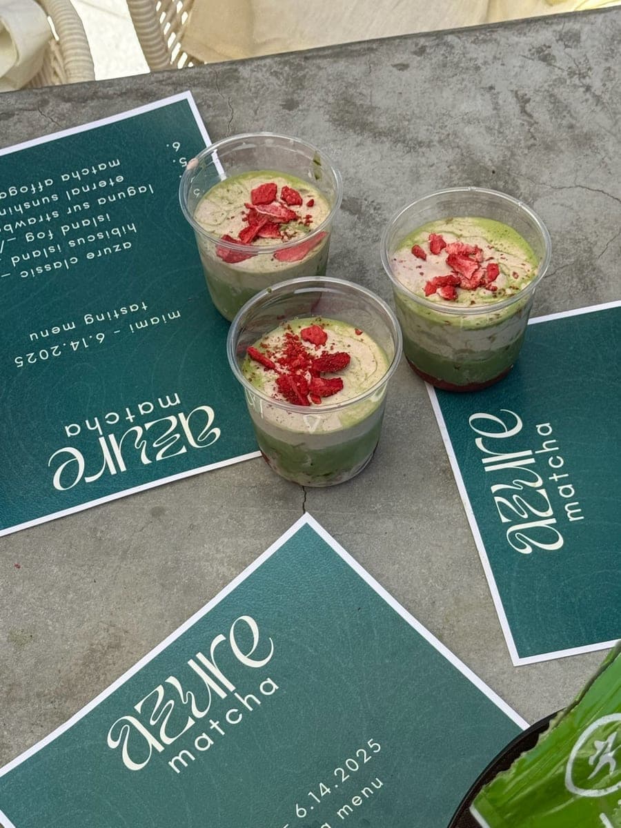 Strawberry matcha tasting cups on Azure Matcha tasting menu cards